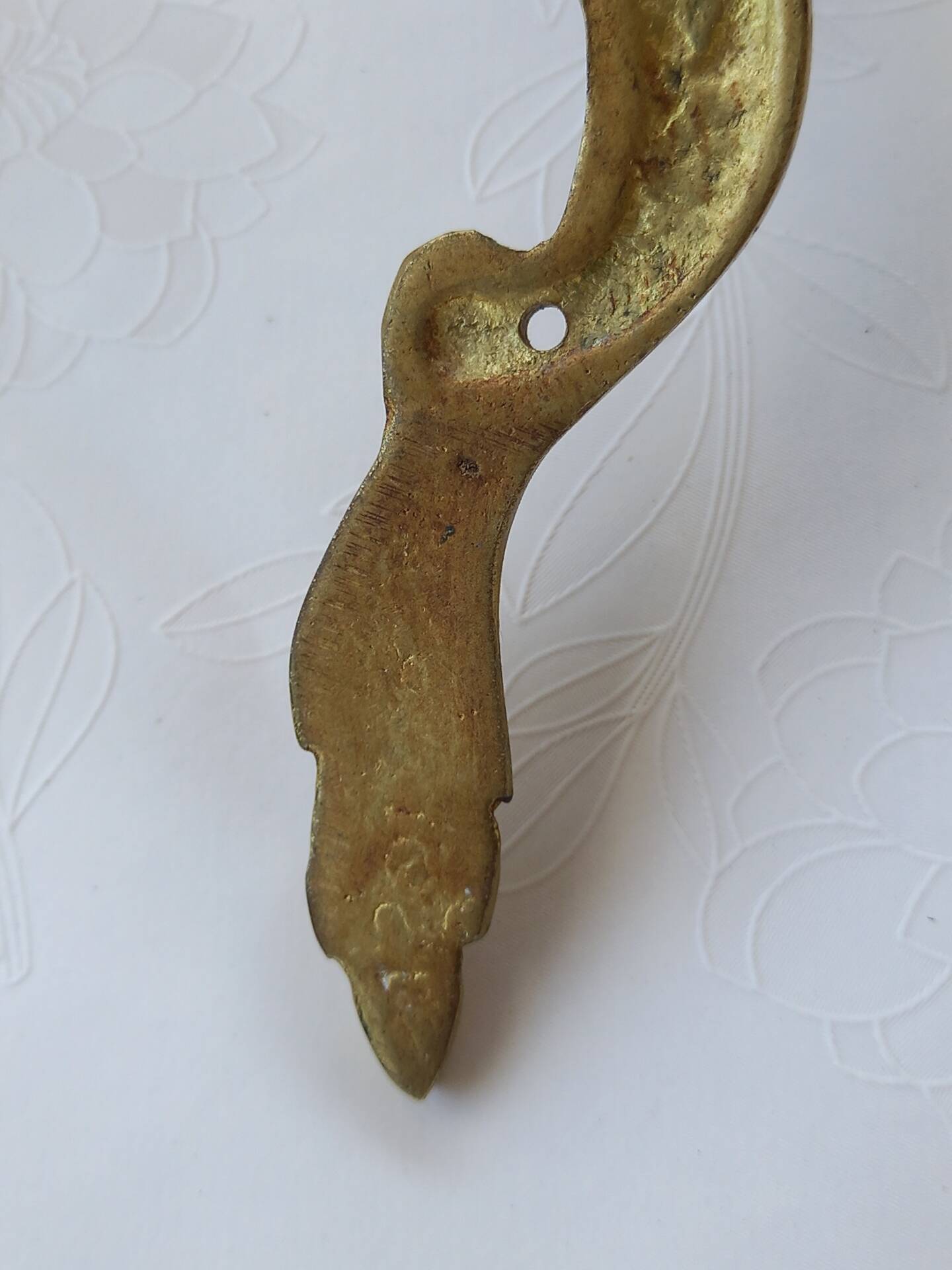 Old pairs of bronze wall sconces
