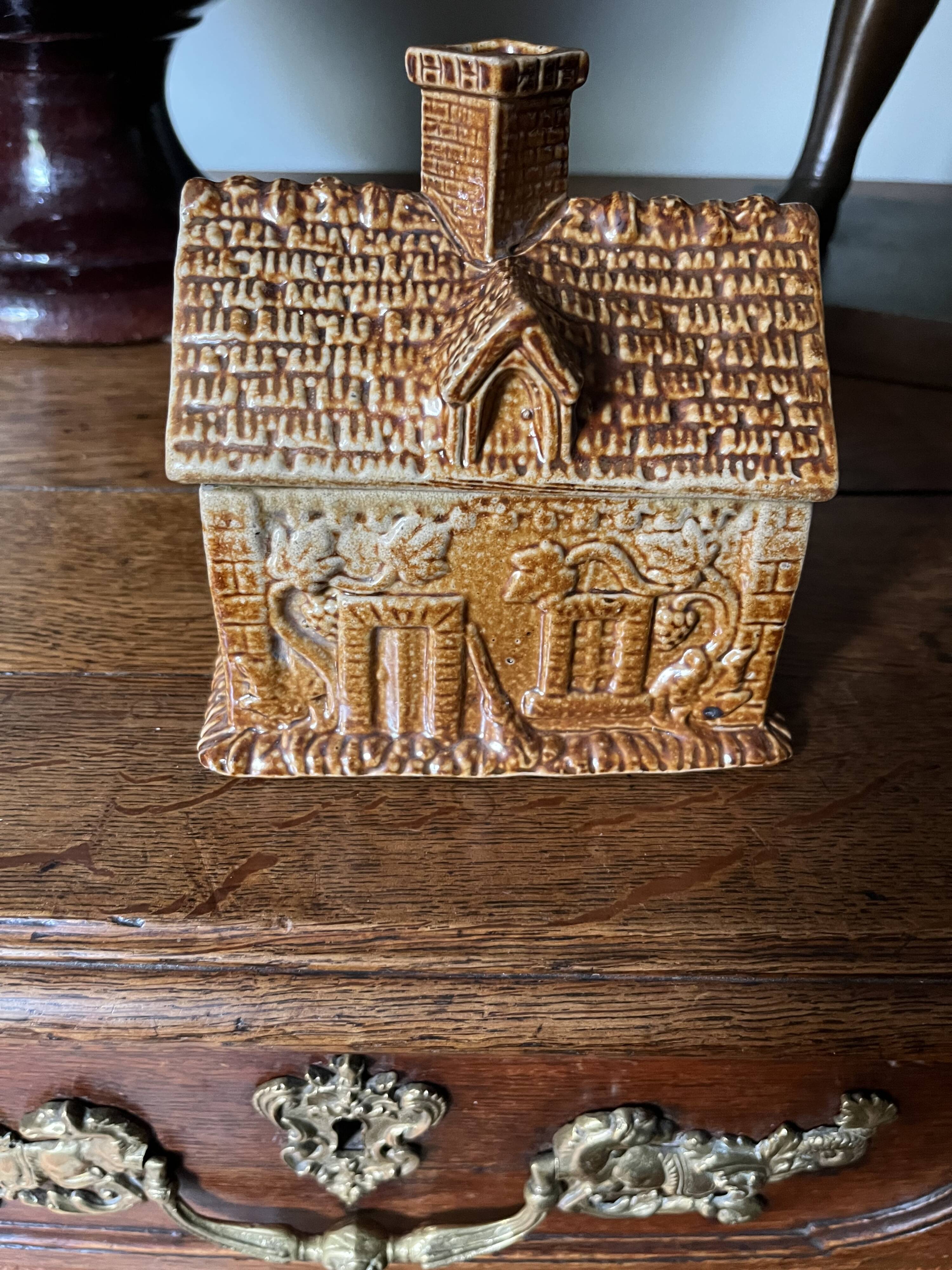 Brown salt-glazed stoneware tobacco pot with candle holder, 1840/1880