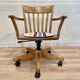 Fauteuil pivotant et inclinable bois massif.