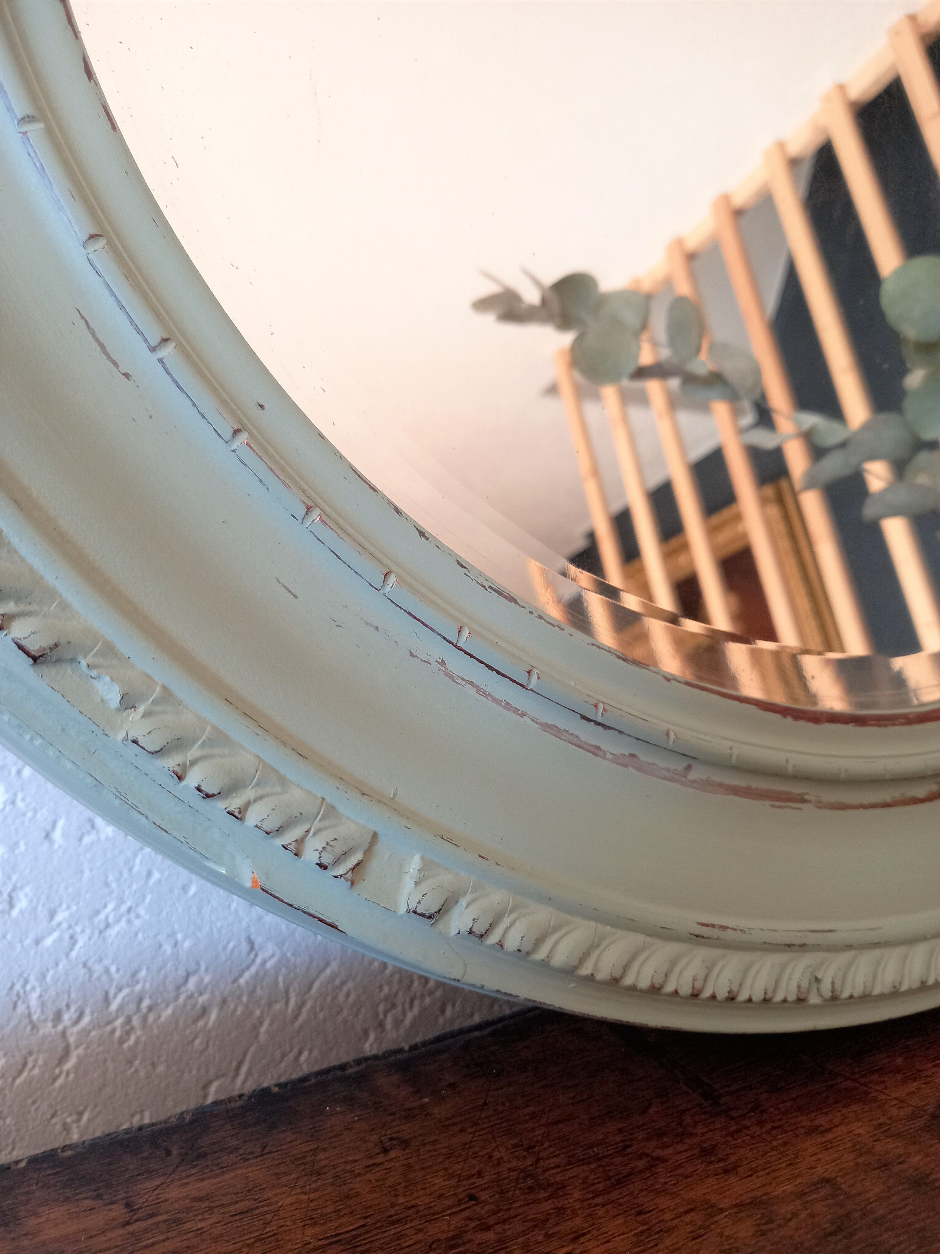 Green oval mirror