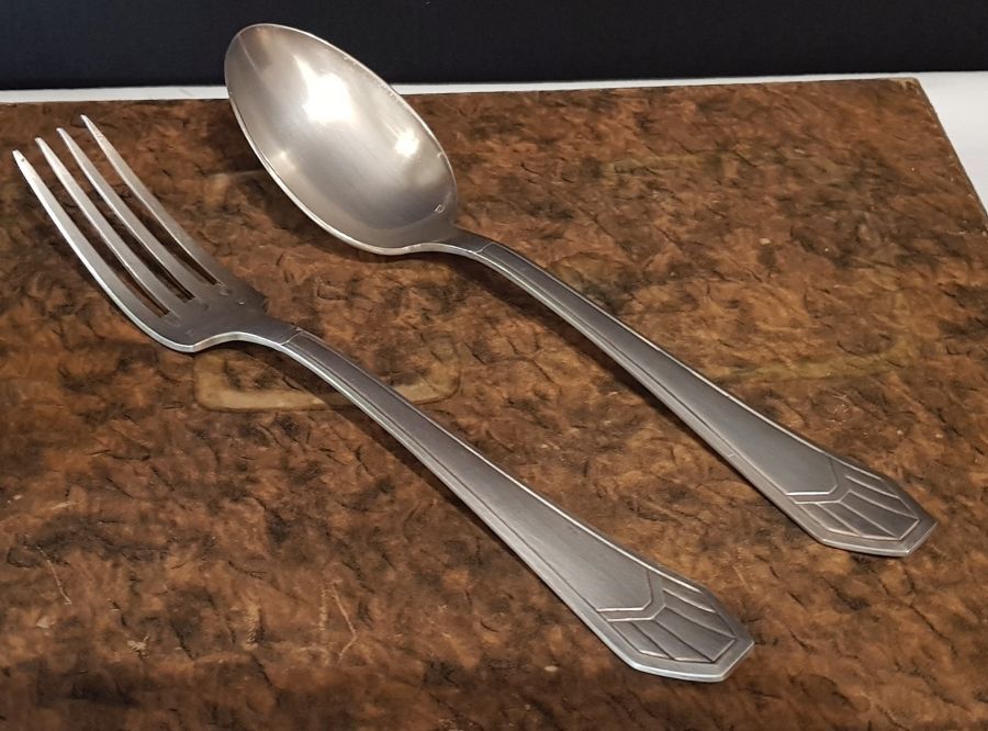 23-piece silver metal art deco cutlery set