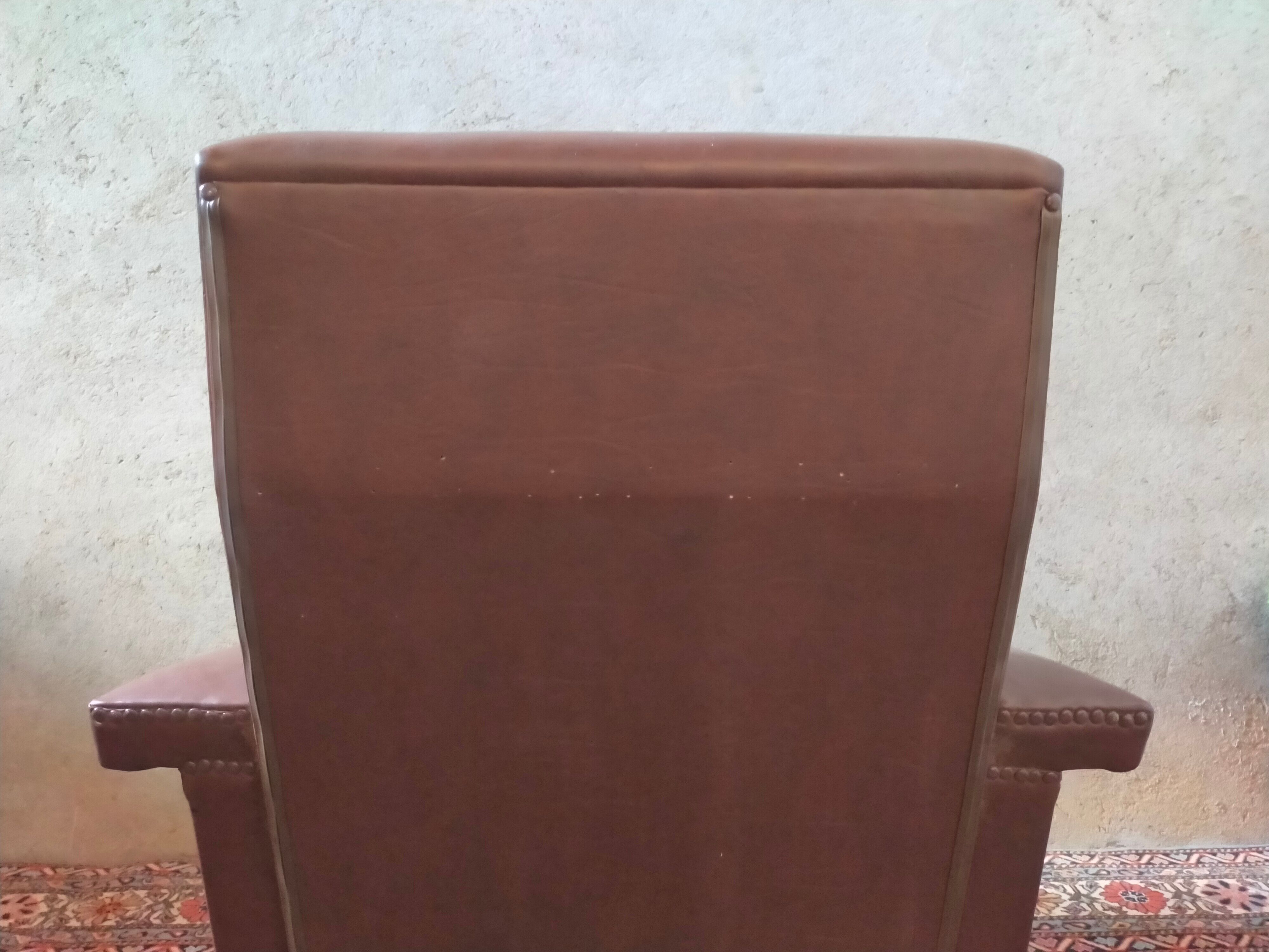 Vintage armchair in skaï