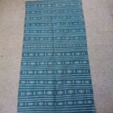 Hand-woven blue and white kilim rug in natural wool