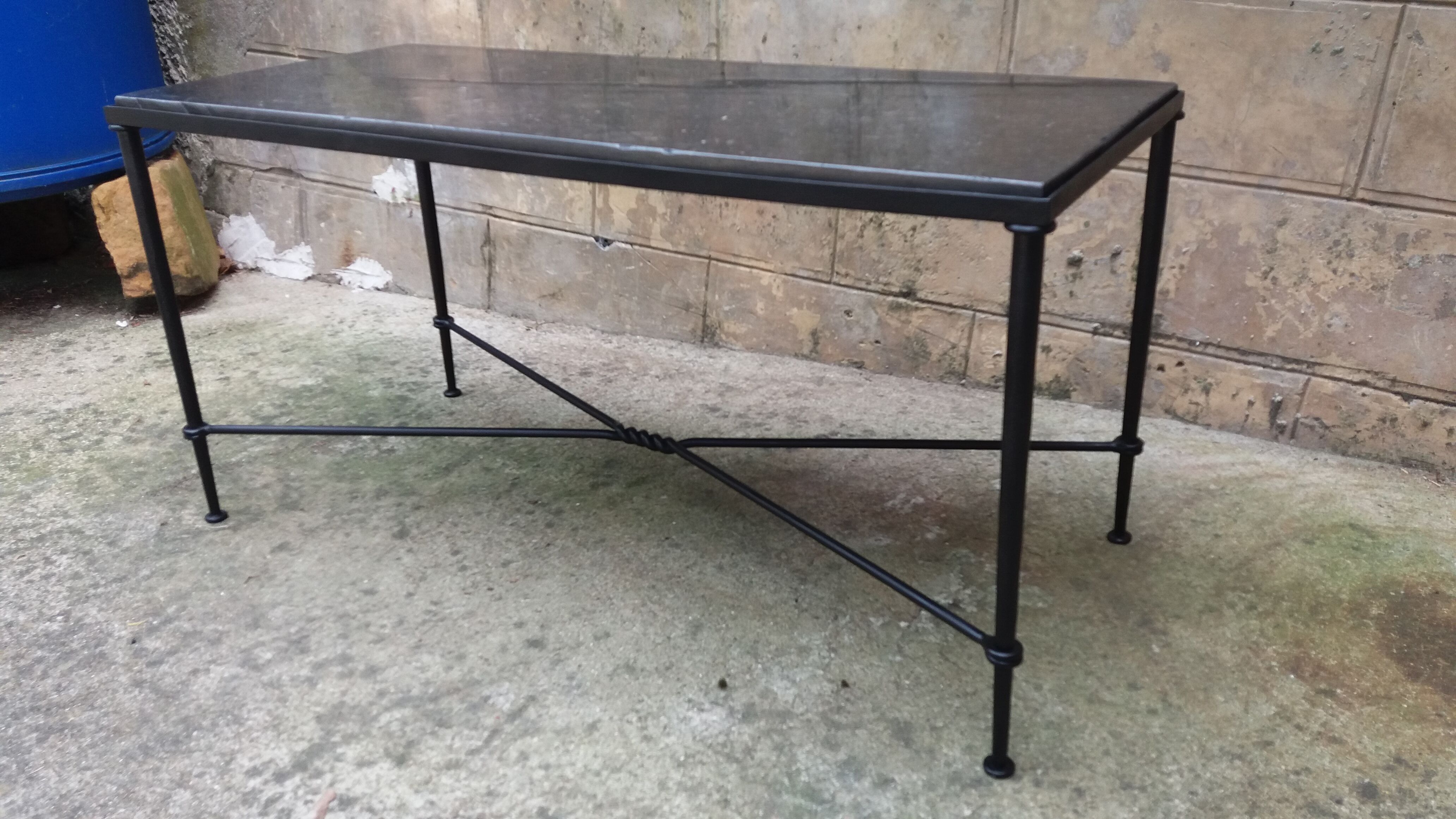 Wrought iron coffee table and marble top