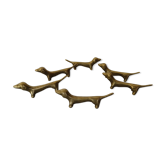 Series of 6 vintage gilded brass dachshund knife holders