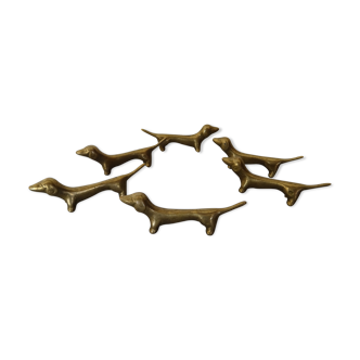 Series of 6 vintage gilded brass dachshund knife holders