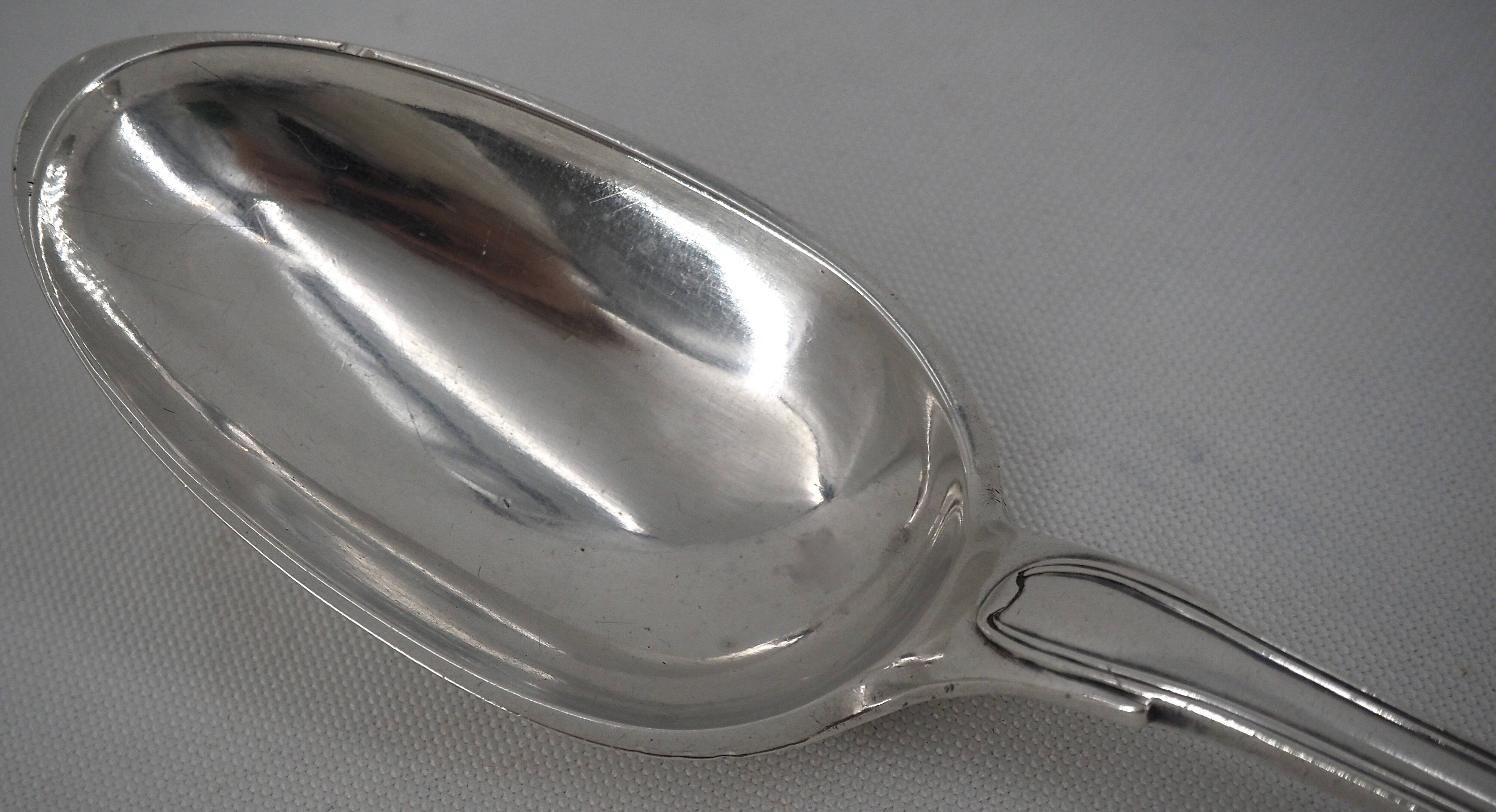 Serving spoon, silver, 18th century, straight thread pattern.