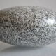 2 boxes in lithographed sheet metal in the shape of a pebble