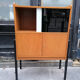 Bookcase, coloured windows, metal base, 1960
