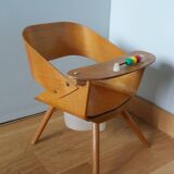 Baumann Baby Coquille children's armchair in bent wood with splayed legs.
