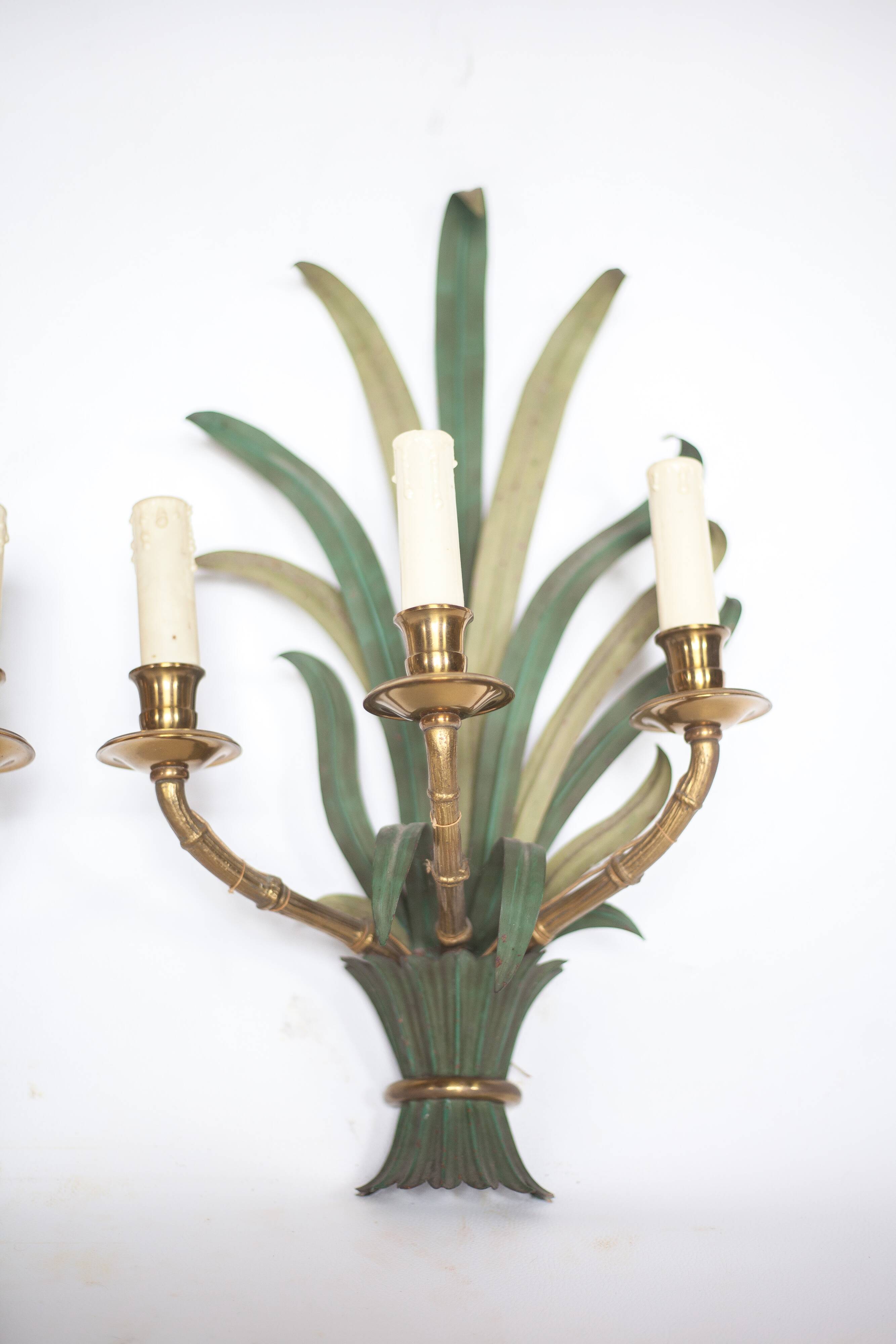 Pair of Maison Baguès wall lights with faux bamboo bronze and metal arms.