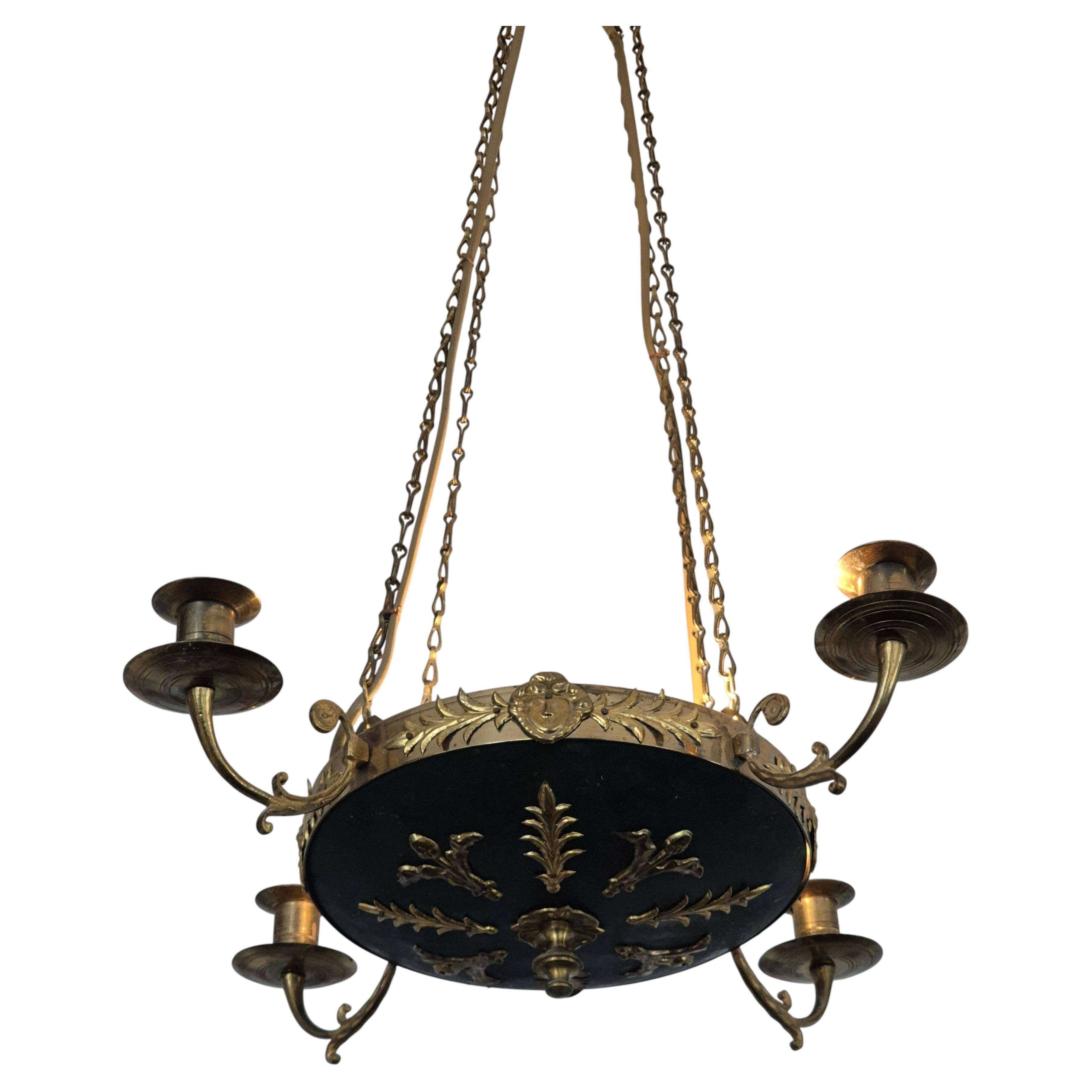 Pendant in brass with two light sockets and four candle holders, Empire style
