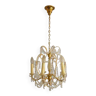 Old chandelier with rhinestone crystal tassels brass body
