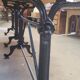 Large bistro table with a wooden top and cast iron legs - 2m56
