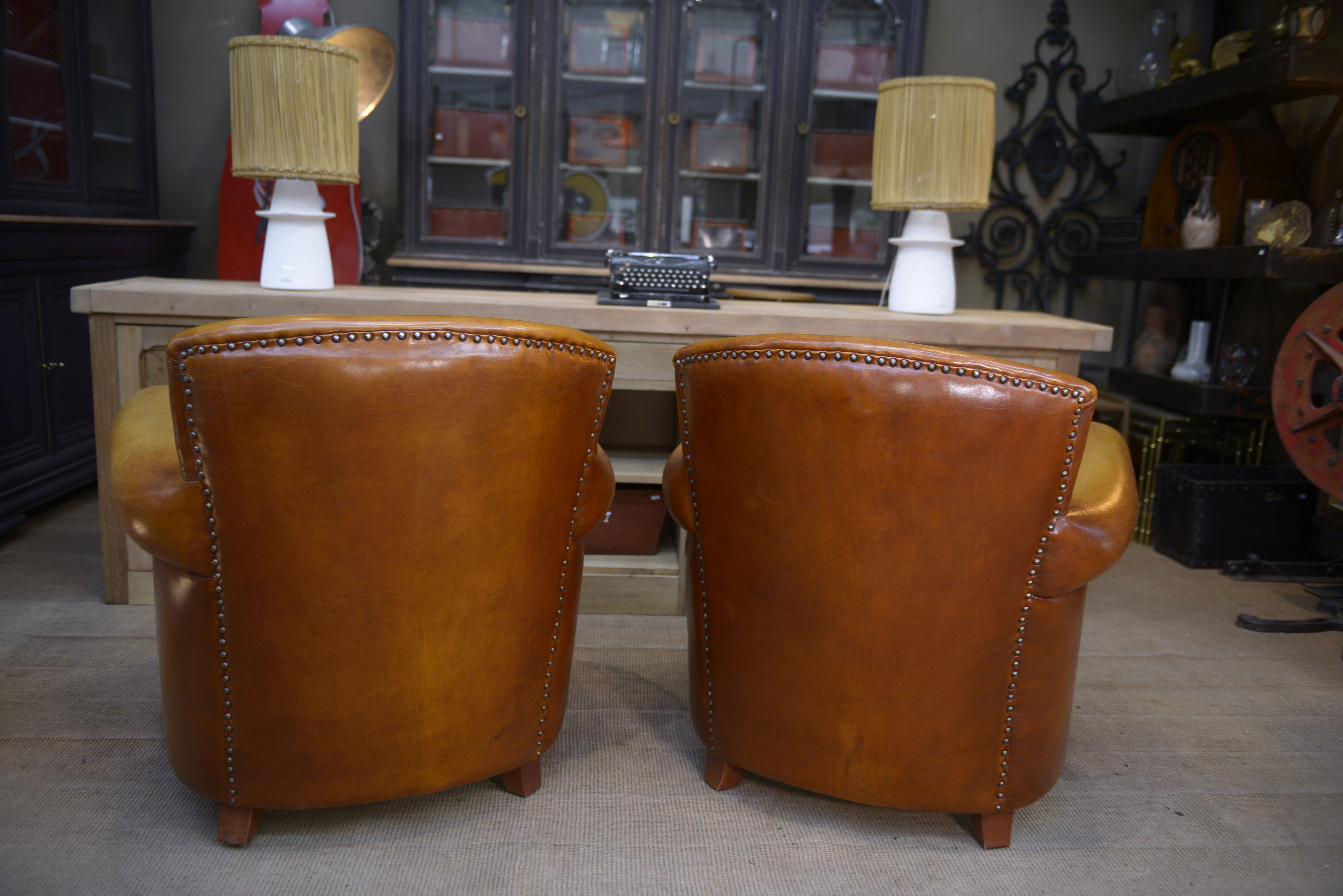 Paire de fauteuils club vintage en cuir