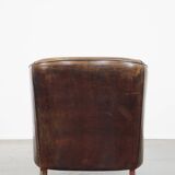 Sheep leather club chair finished with black piping