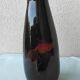 Vase en bois laqué