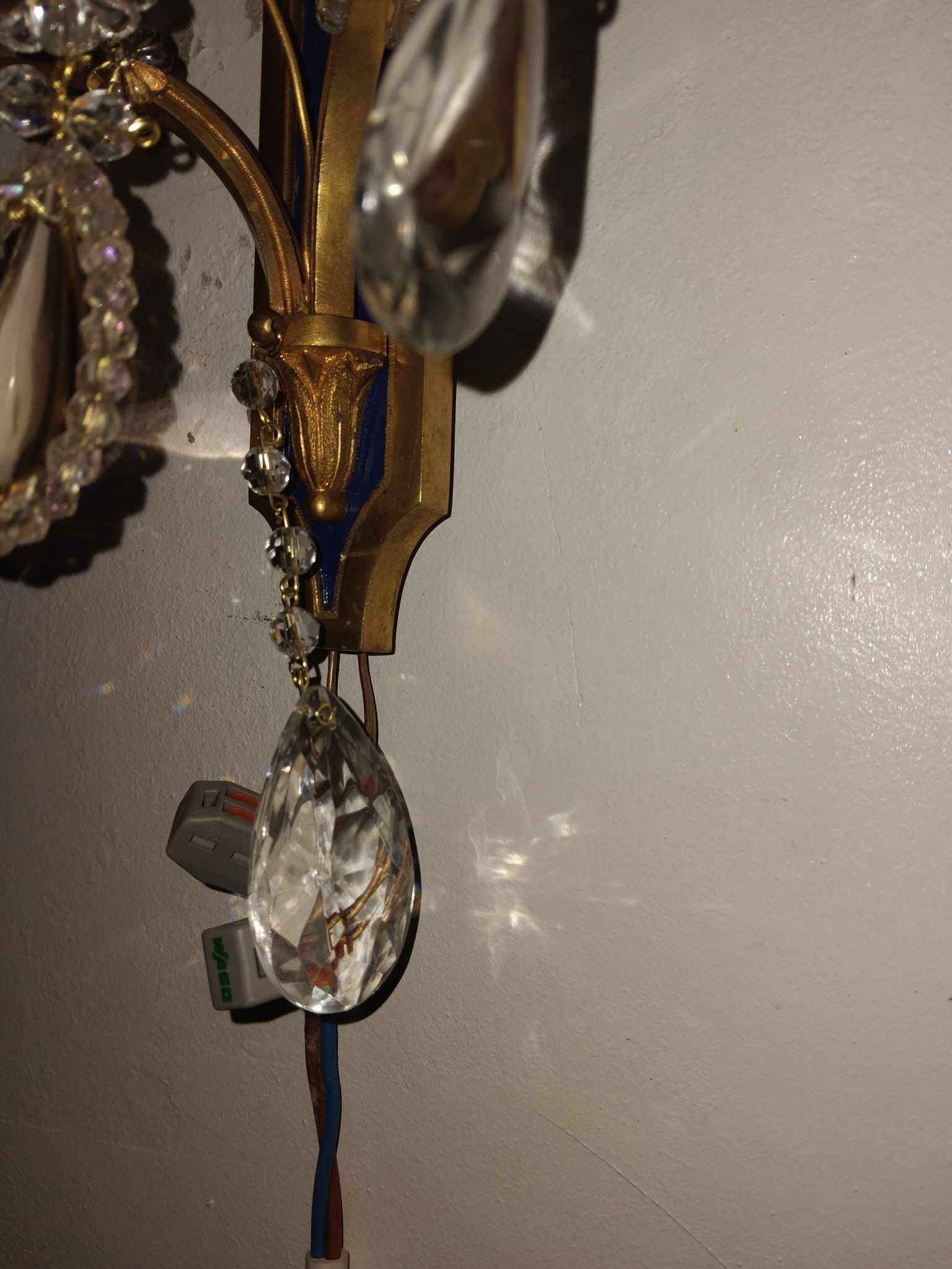 Pair of Louis XVI style gilt bronze wall lights