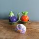 Vegetable salt and pepper shaker in slip