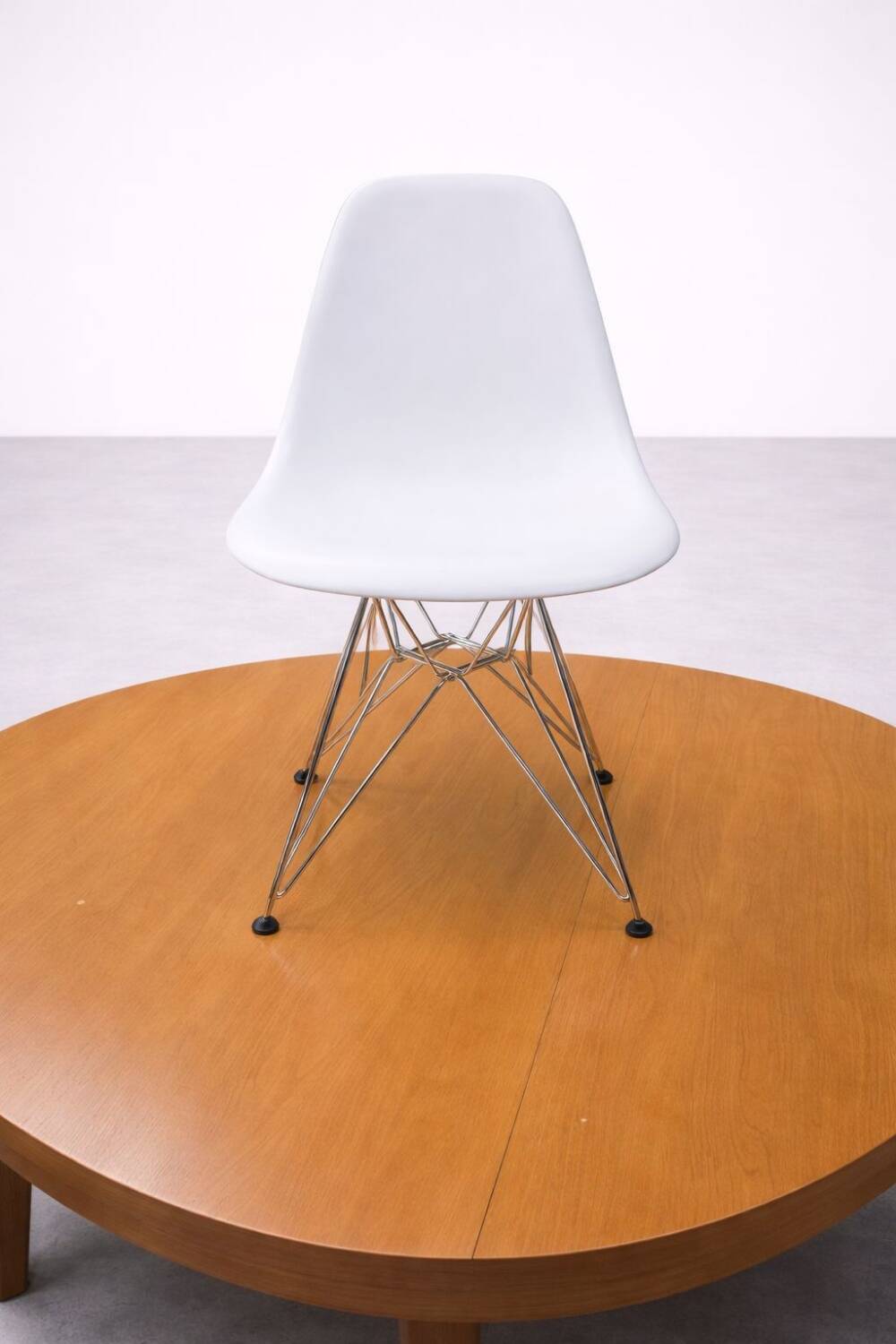 White DSR style Eames chair by Vitra with chrome Eiffel base.