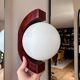 Pair of "Bascules" wall lights in wood and opaline glass - 1970.