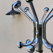 Vintage chrome coat rack parrot design from the 70s and 80s.