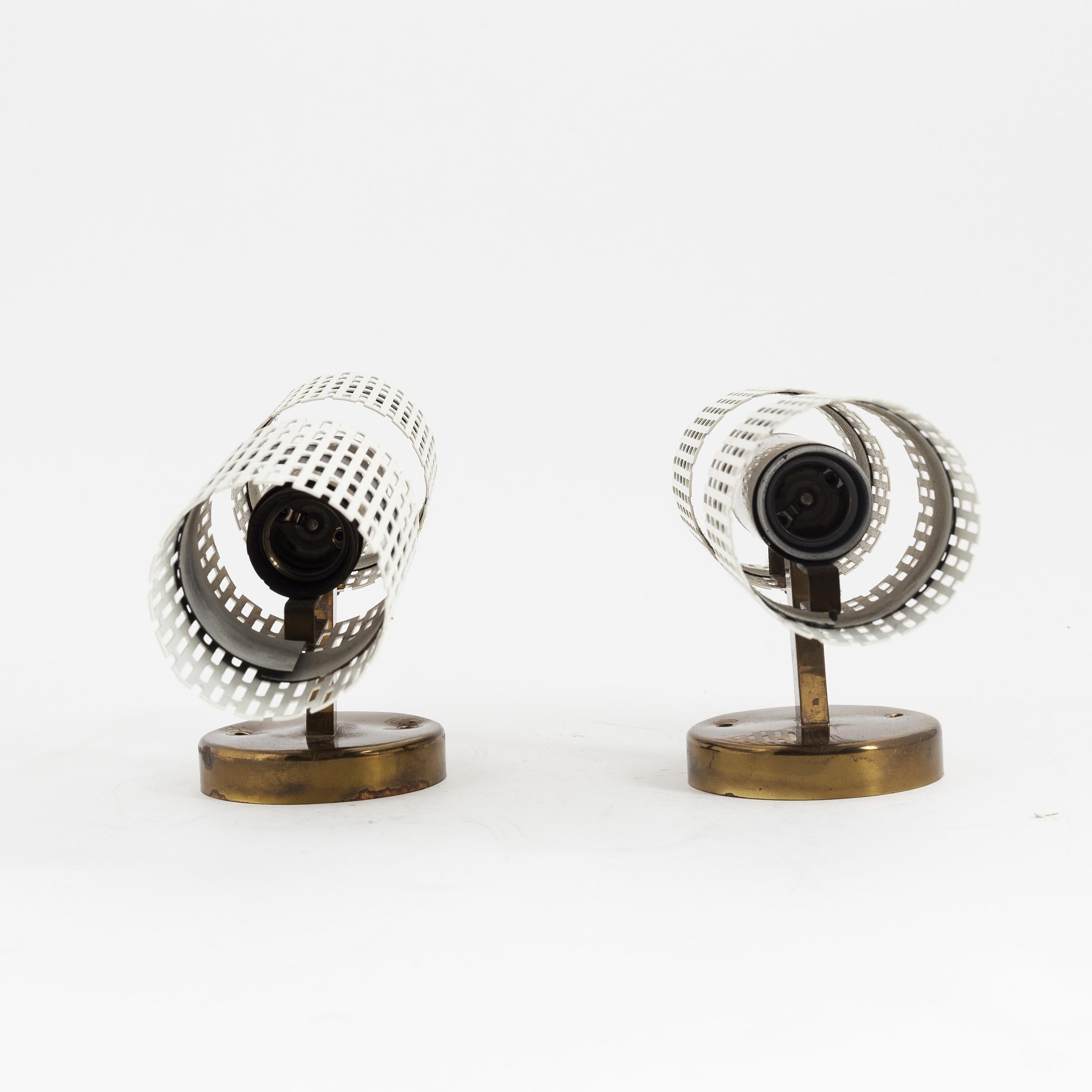 Rare pair of wall lights by Harald Notini model 11262 for Bohlmarks, 1950.