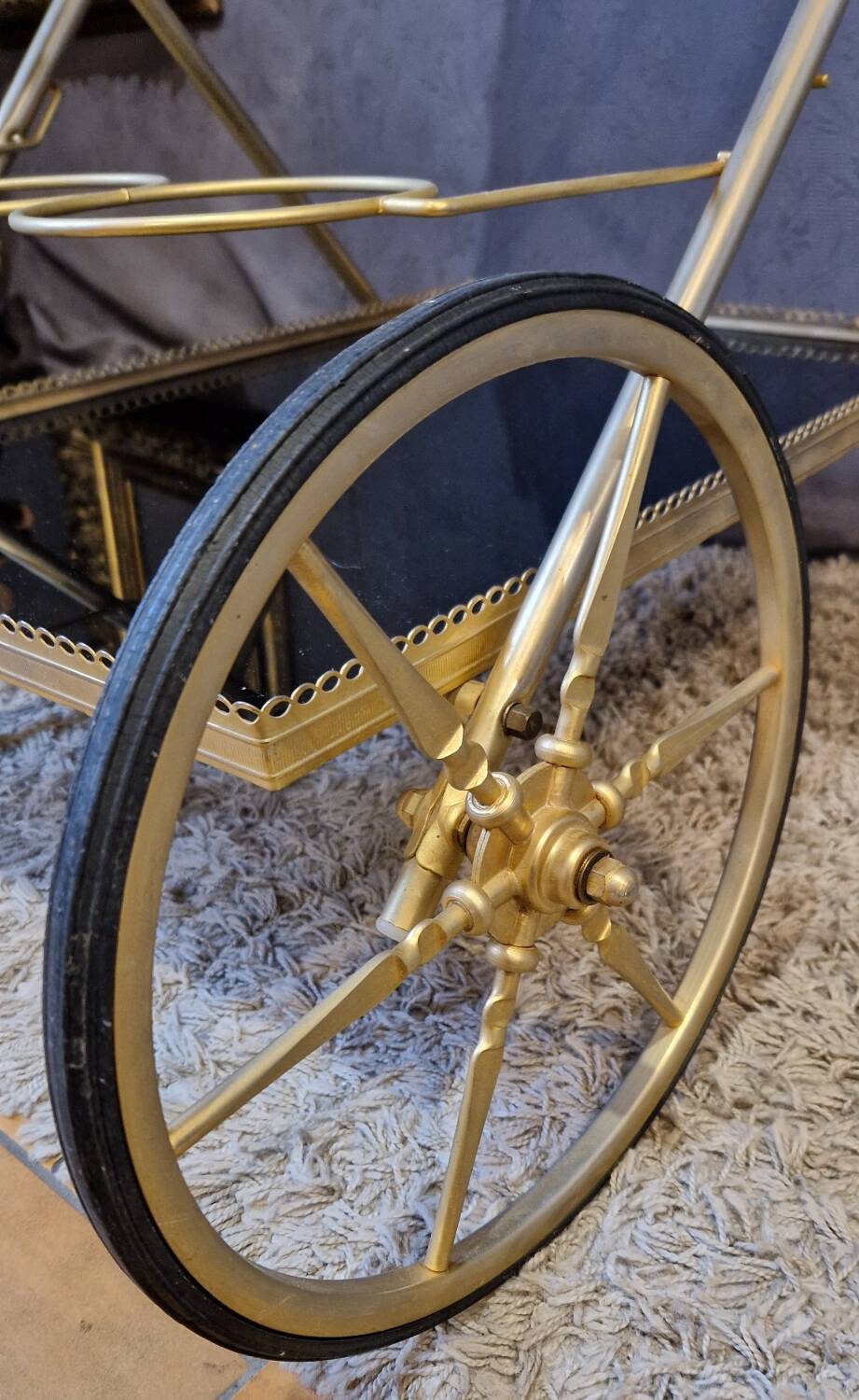 Brass rolling trolley