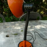 Orange and black arm metal table lamp flexible
