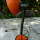 Orange and black arm metal table lamp flexible