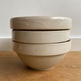 Trio of beige enamelled sandstone bowls