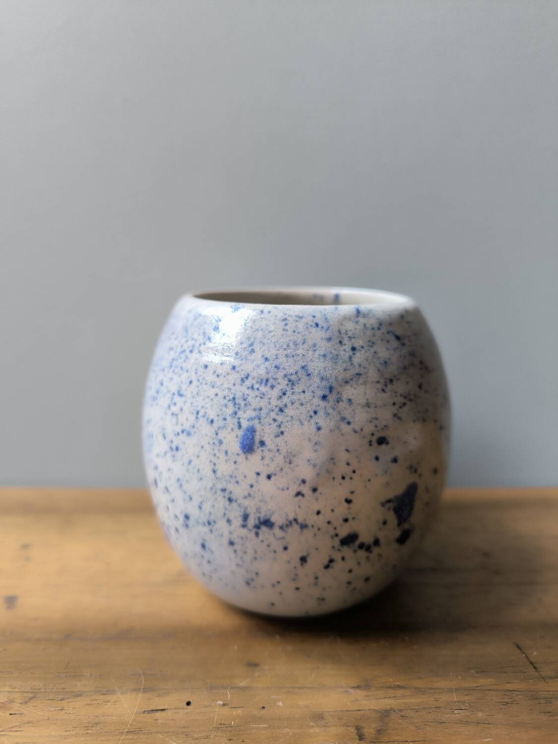 Speckled glazed stoneware ceramic cups, handmade in blue and white