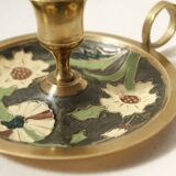 Set of 2 round golden metal candle holders and floral patterns