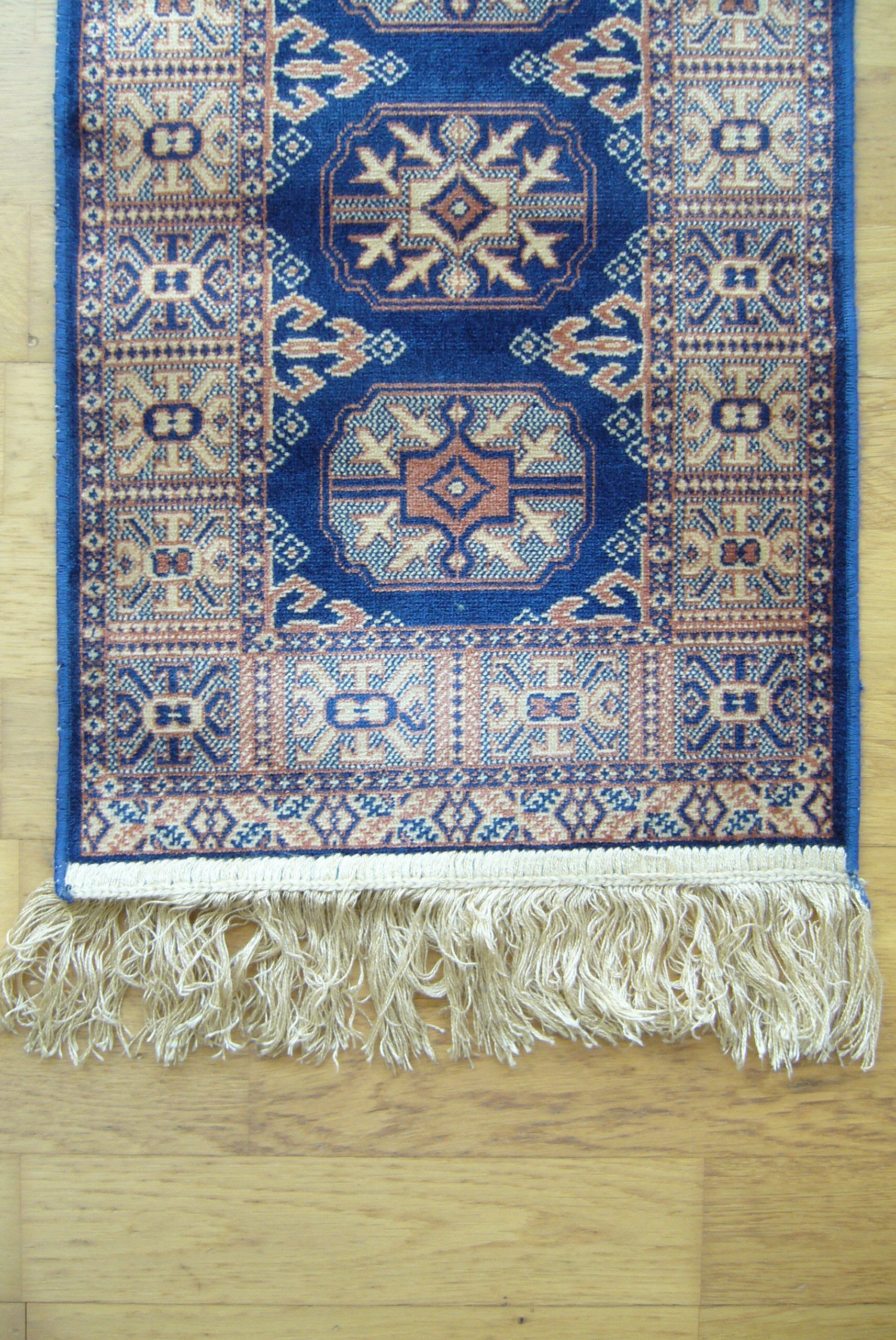 Three oriental rugs 35 x 70 cm