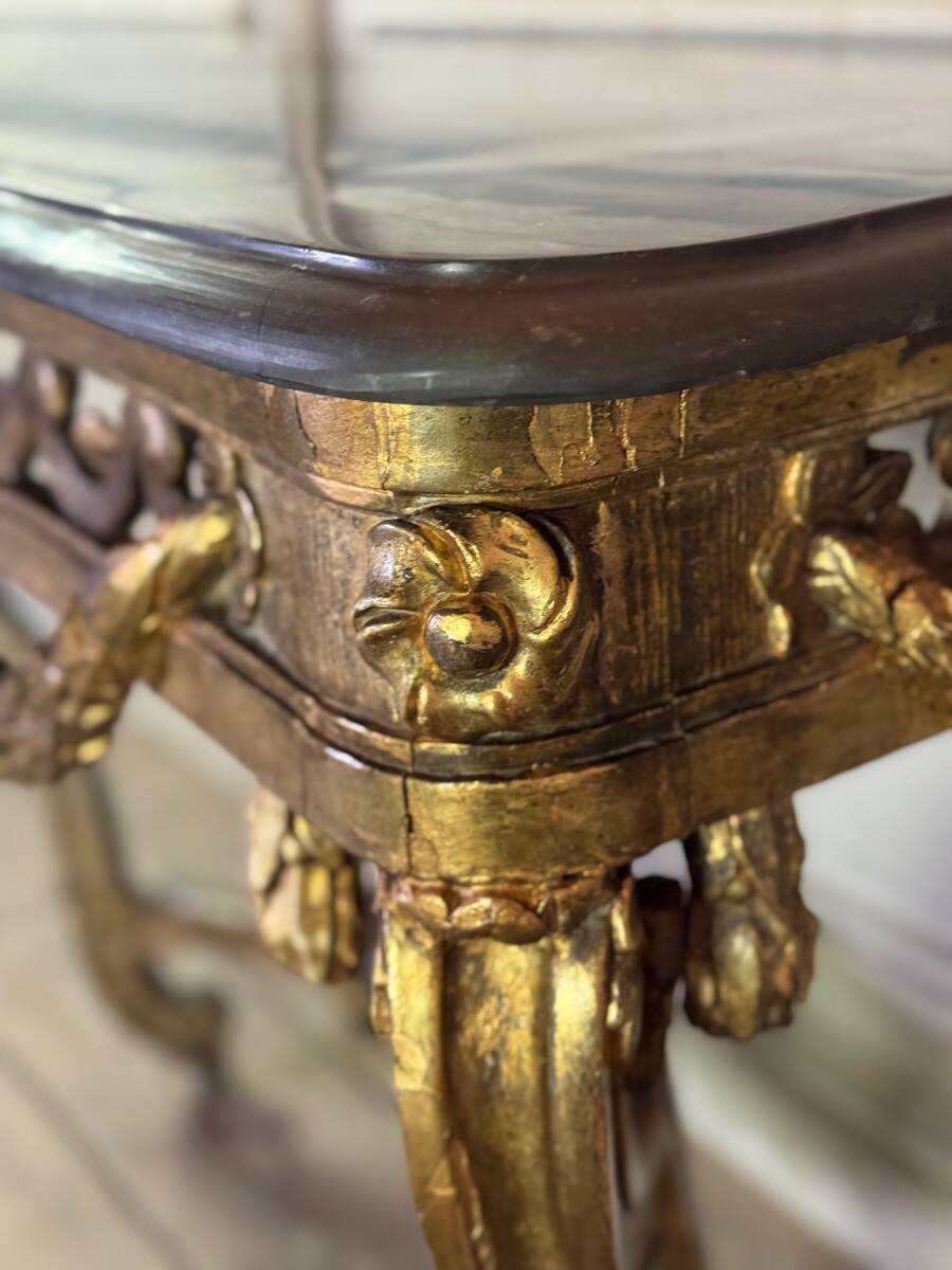 Transitional console in carved and gilded wood, France, 18th century