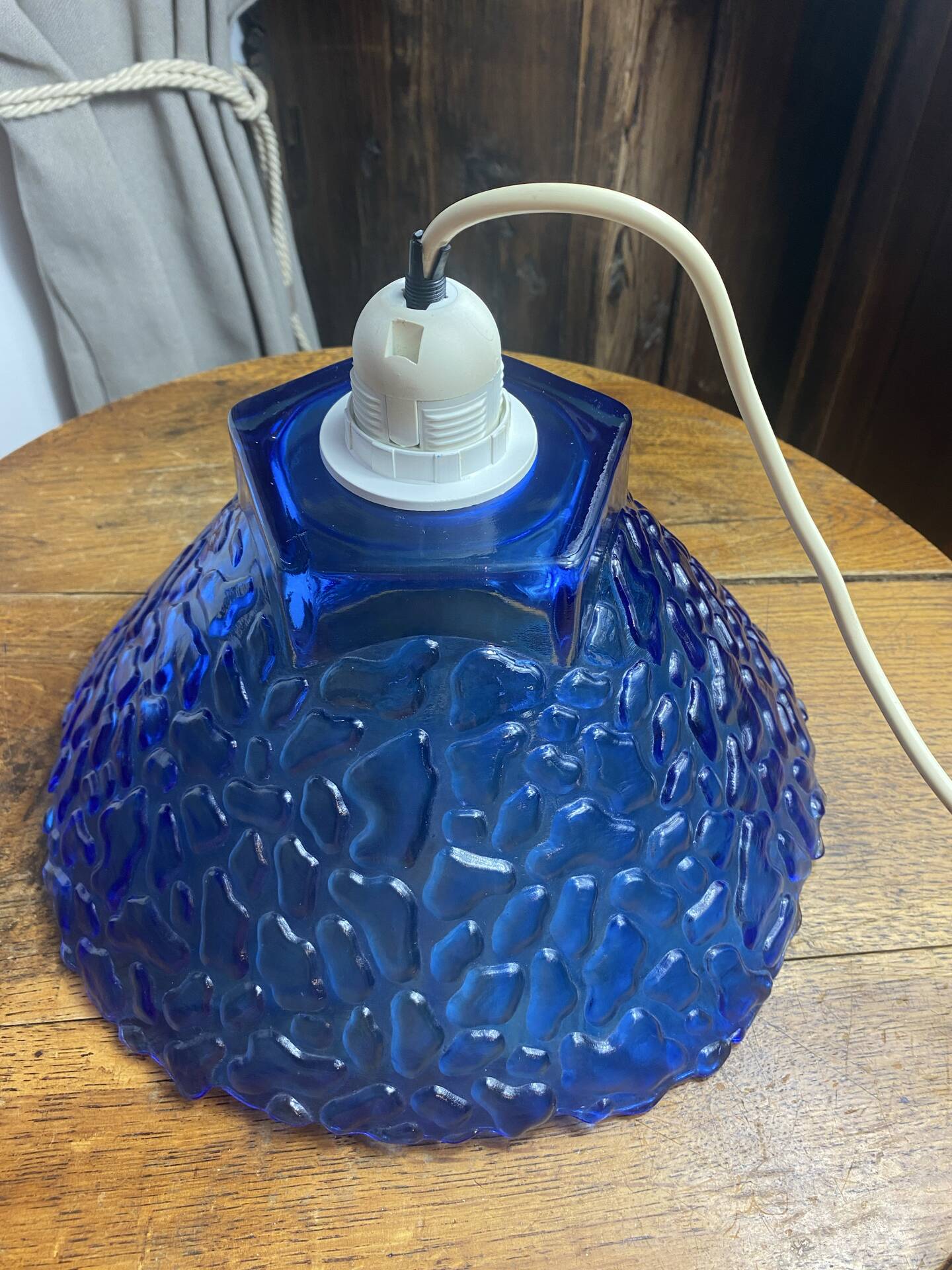 Blue moulded glass suspension