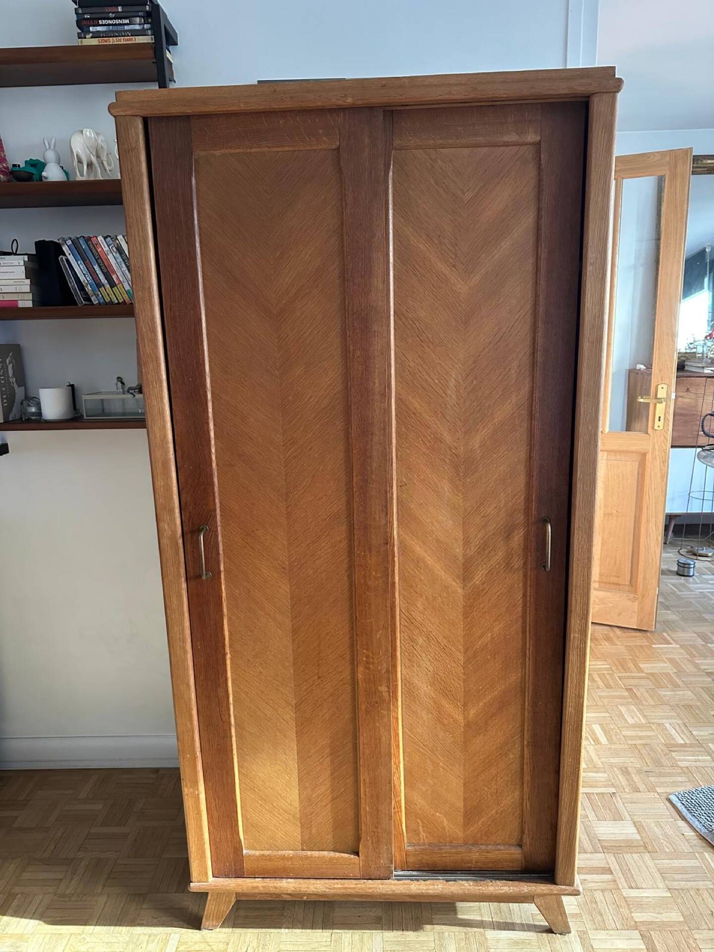 Scandinavian wooden wardrobe with sliding doors