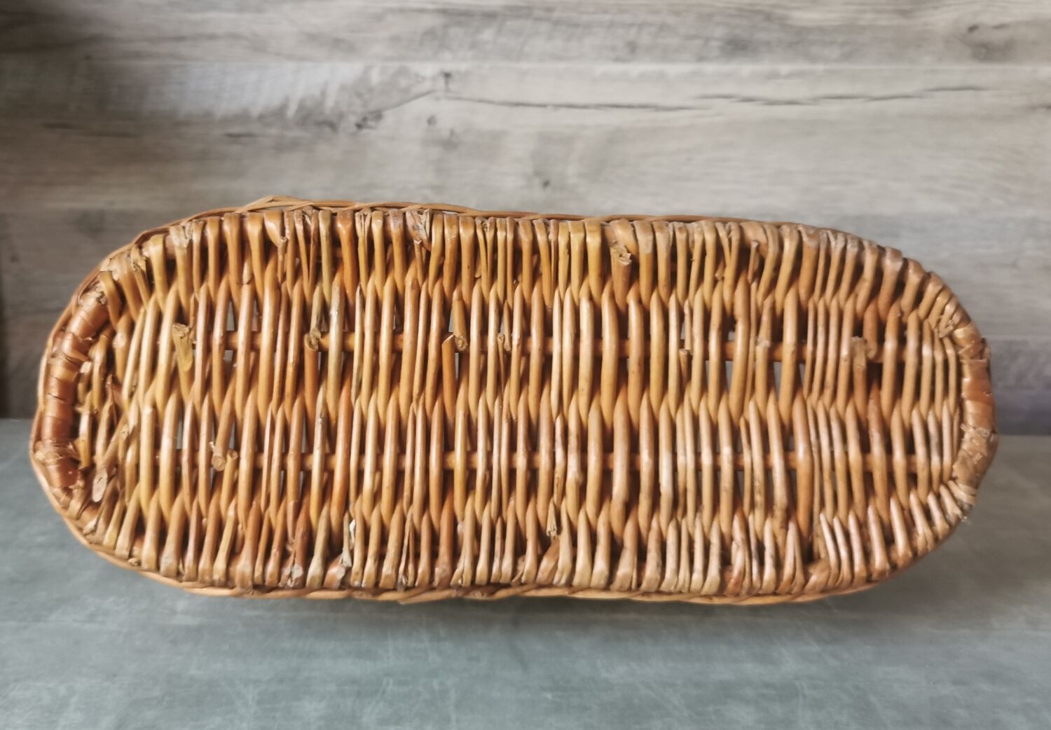 Vintage wicker bottle rack