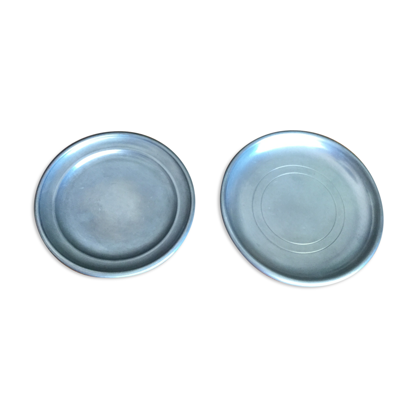Bottle mats punched tin
