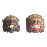 Two polychrome painted and gold leaf gilded Barong dance masks from Bali, Indonesia.