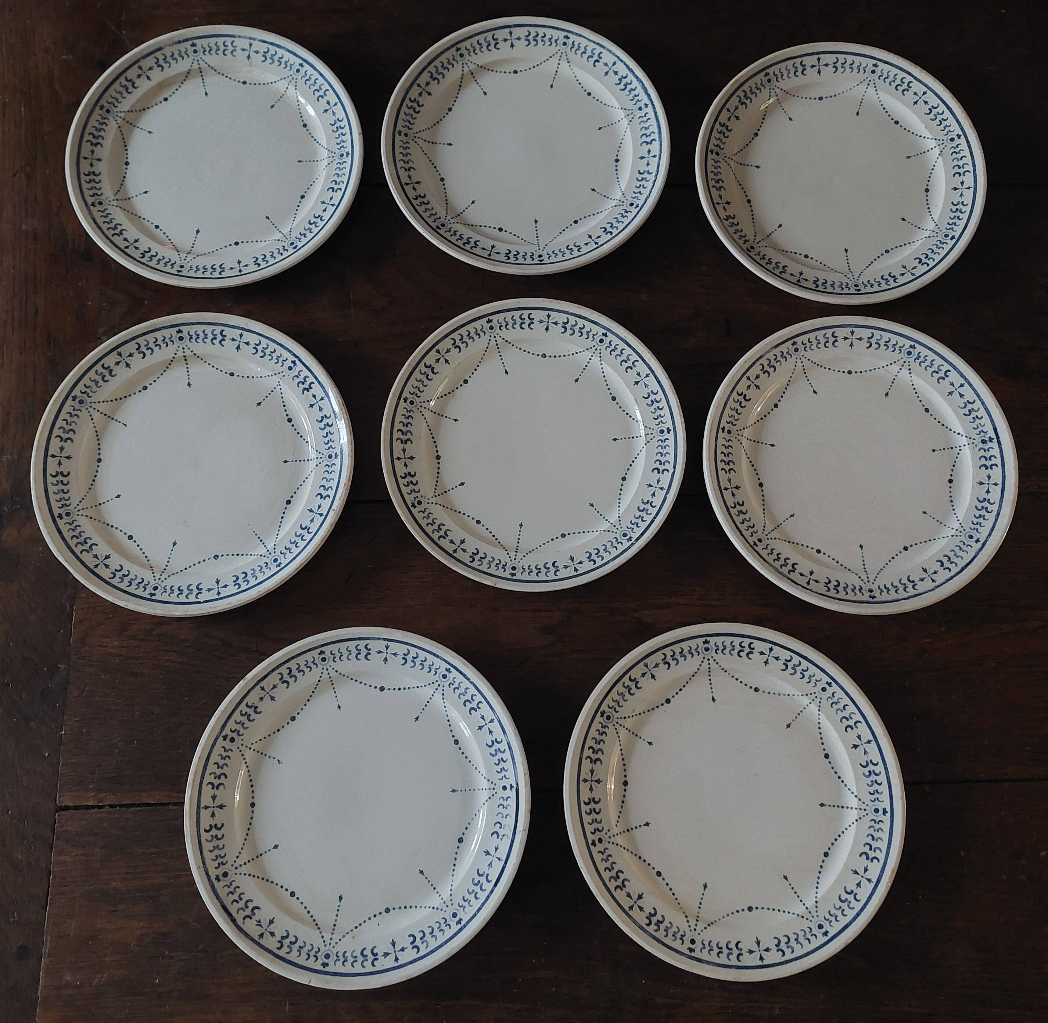 Set of eight flat plates, ironstone, Géon Rouard, Lille decoration, years.