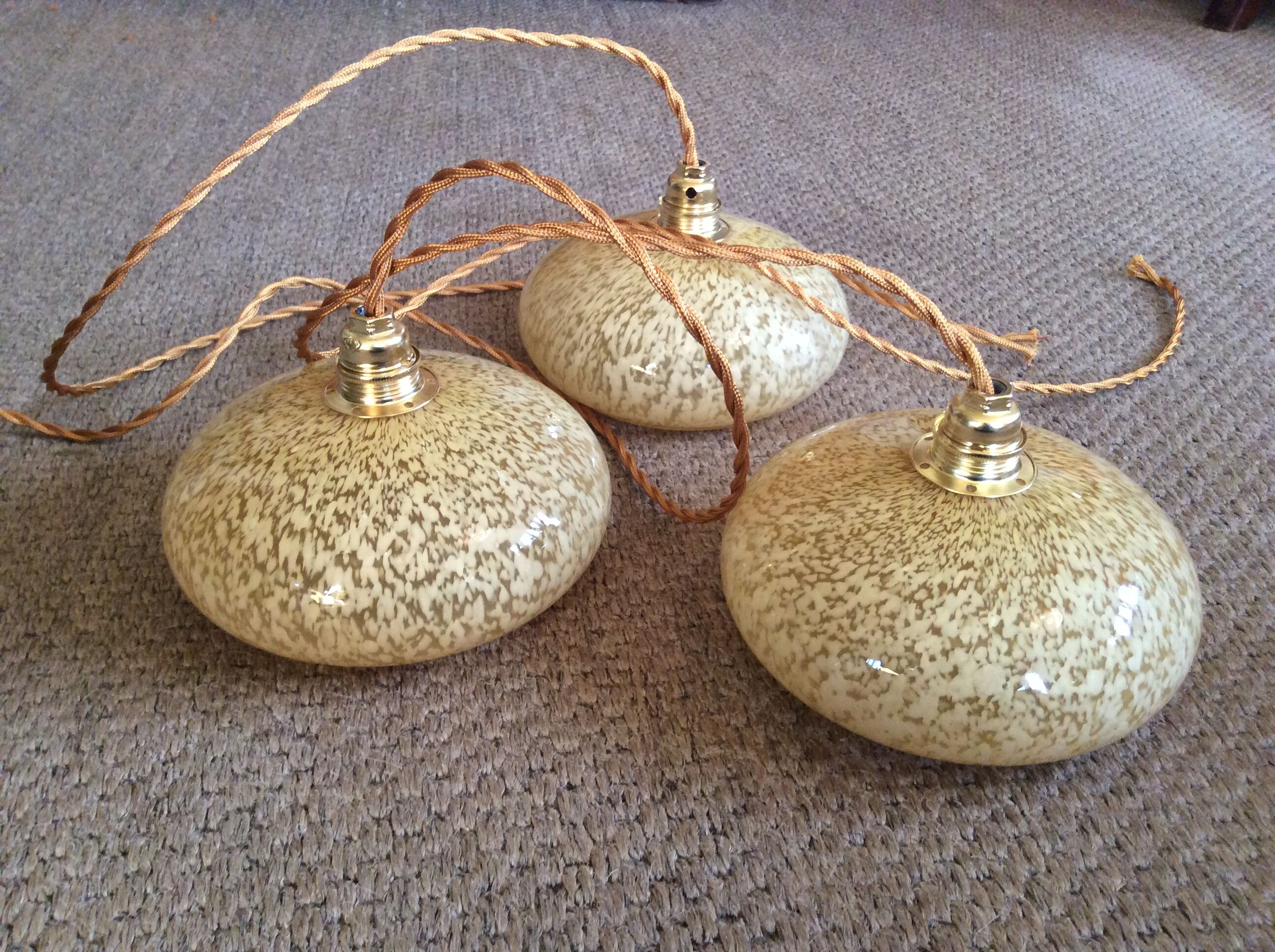 Trio of vintage suspensions