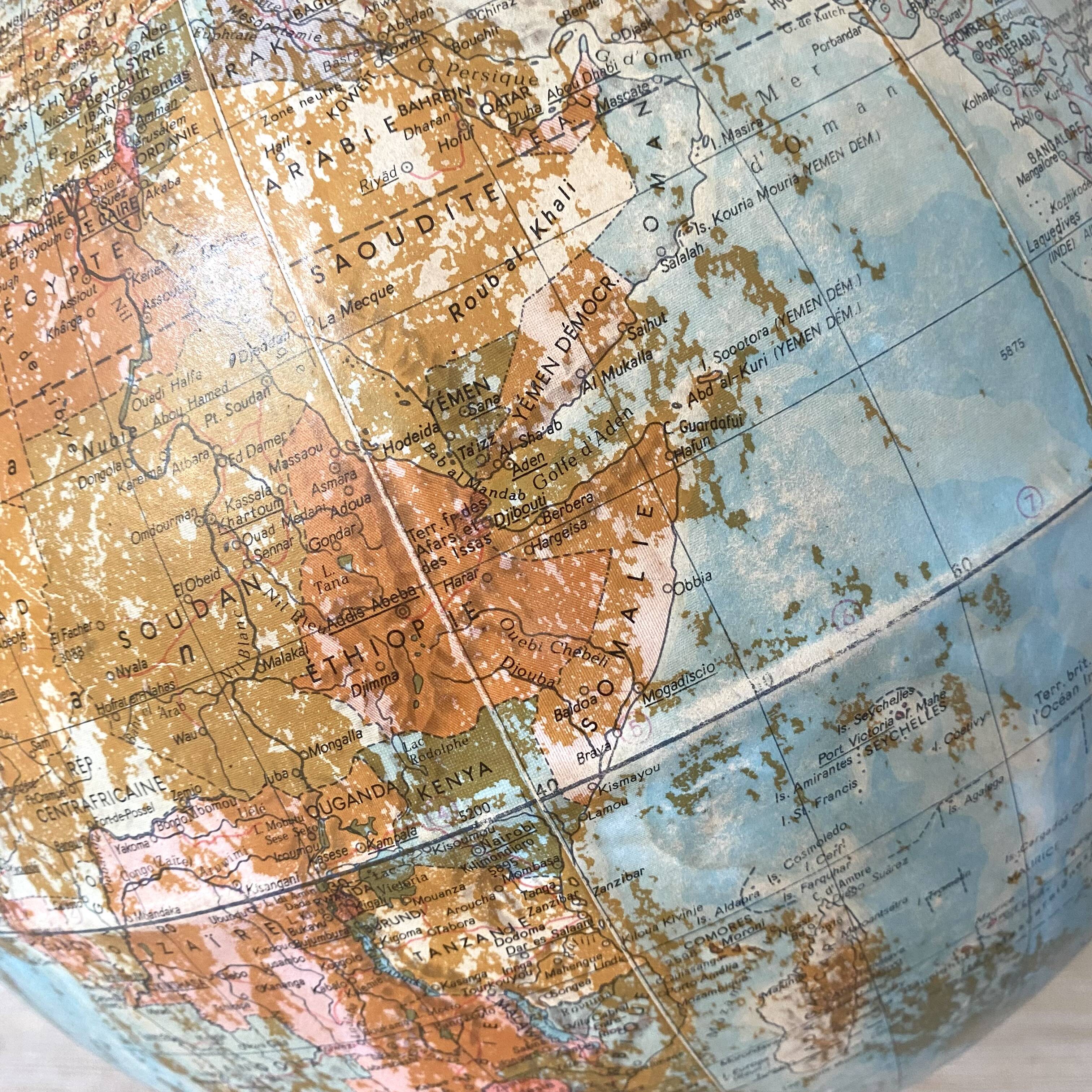 Old terrestrial globe with wooden base H46 cm