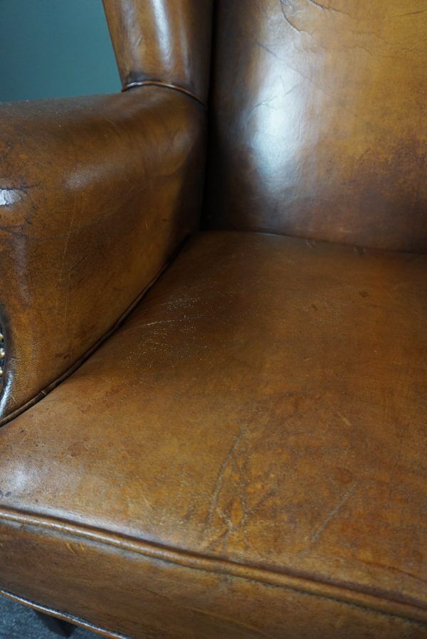 Armchair + sheepskin pouf