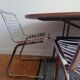 2 chrome wired chairs