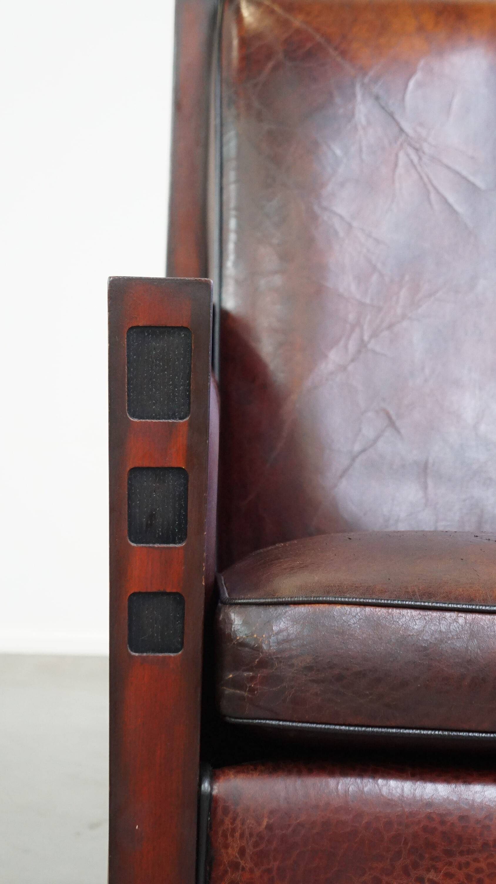 Sheepskin Art Deco design armchair combined with wood