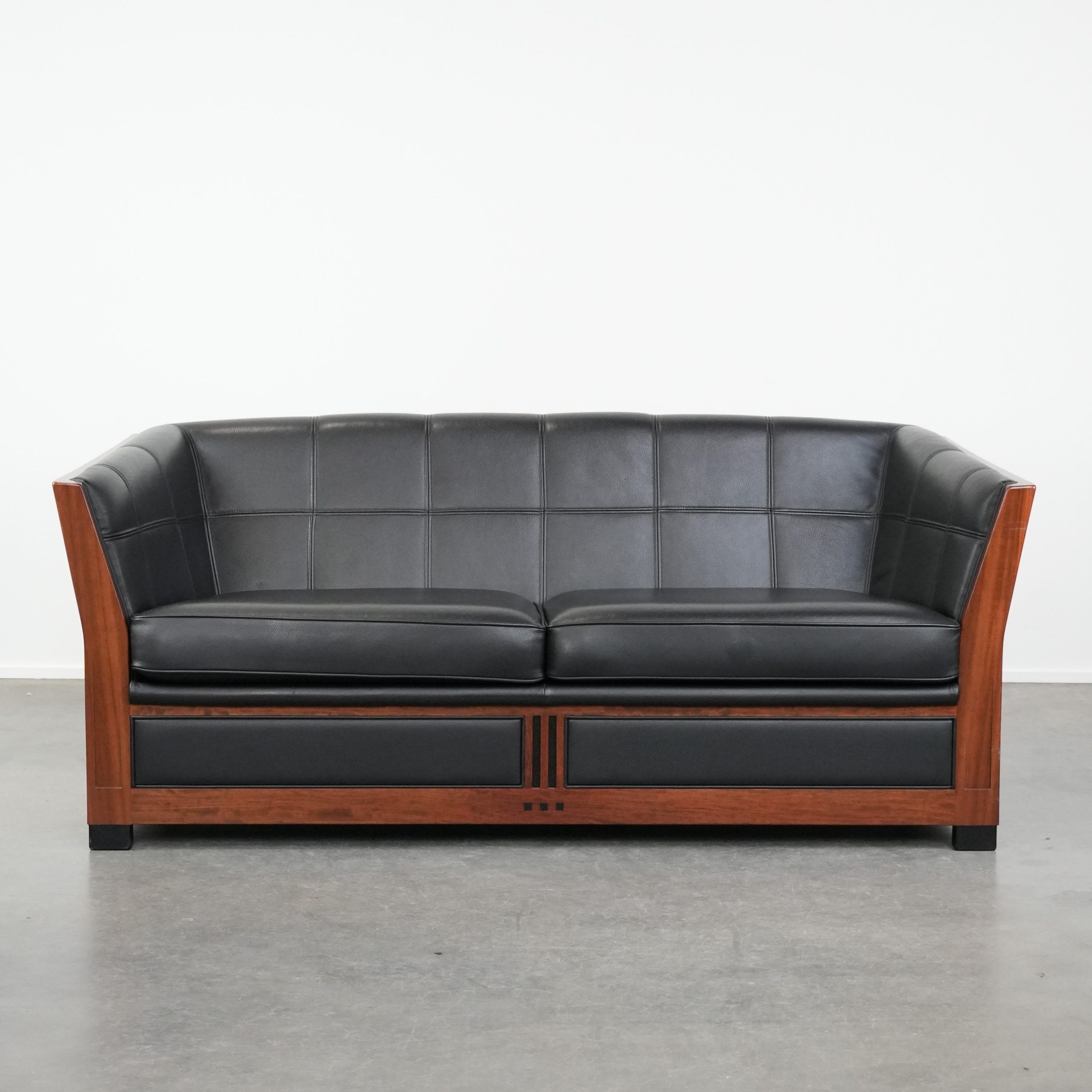 Art Deco  black leather 2.5-seater design sofa with beautiful woodwork