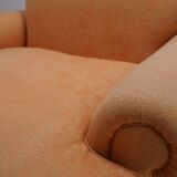 Deep seated armchair in the style of Howard & Sons