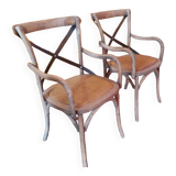 Angled wooden armchairs