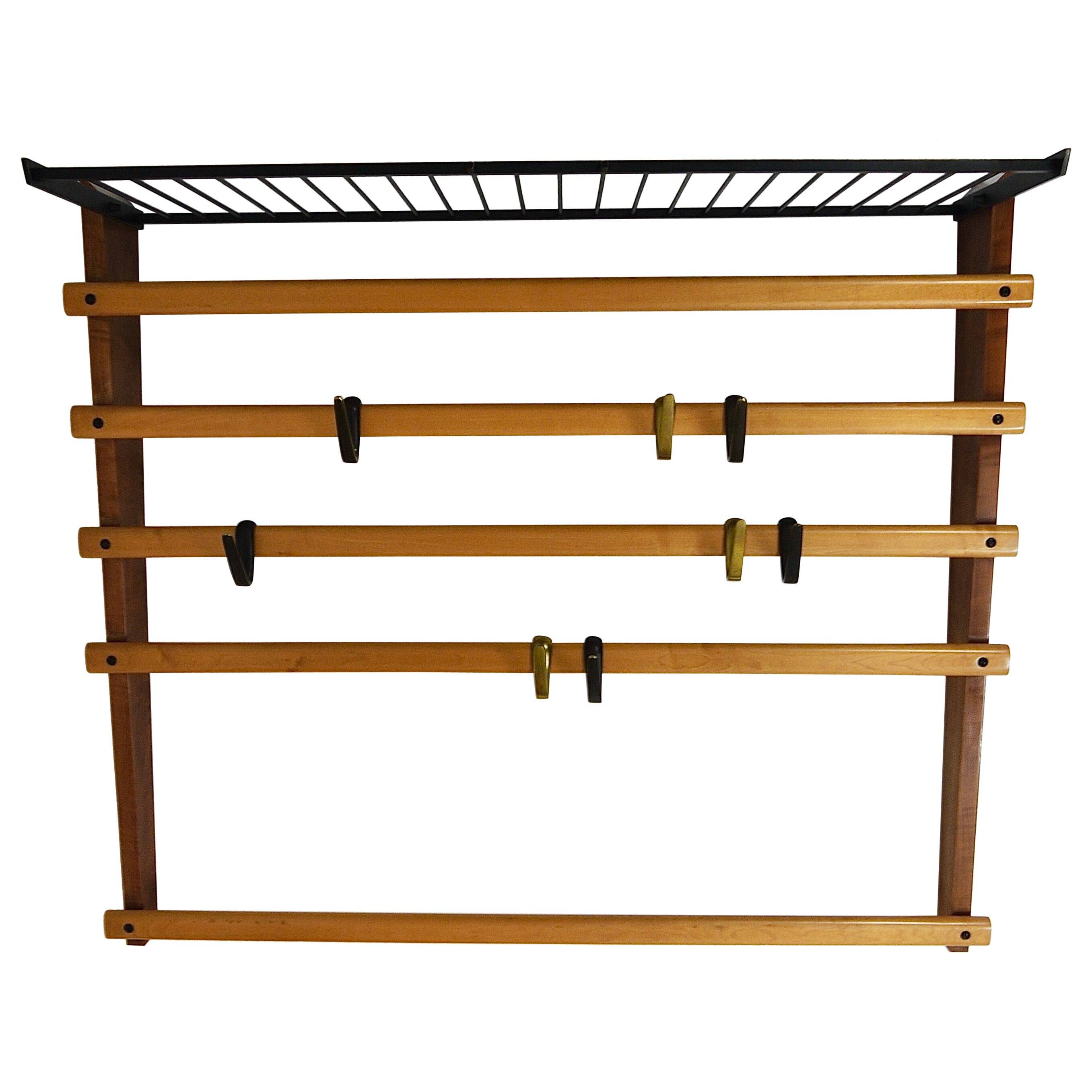 Rare coat rack by Carl Auböck with hat rack, cabinet, brass, walnut and beech, 1950s.